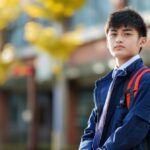 Young Person with Backpack. IB exam